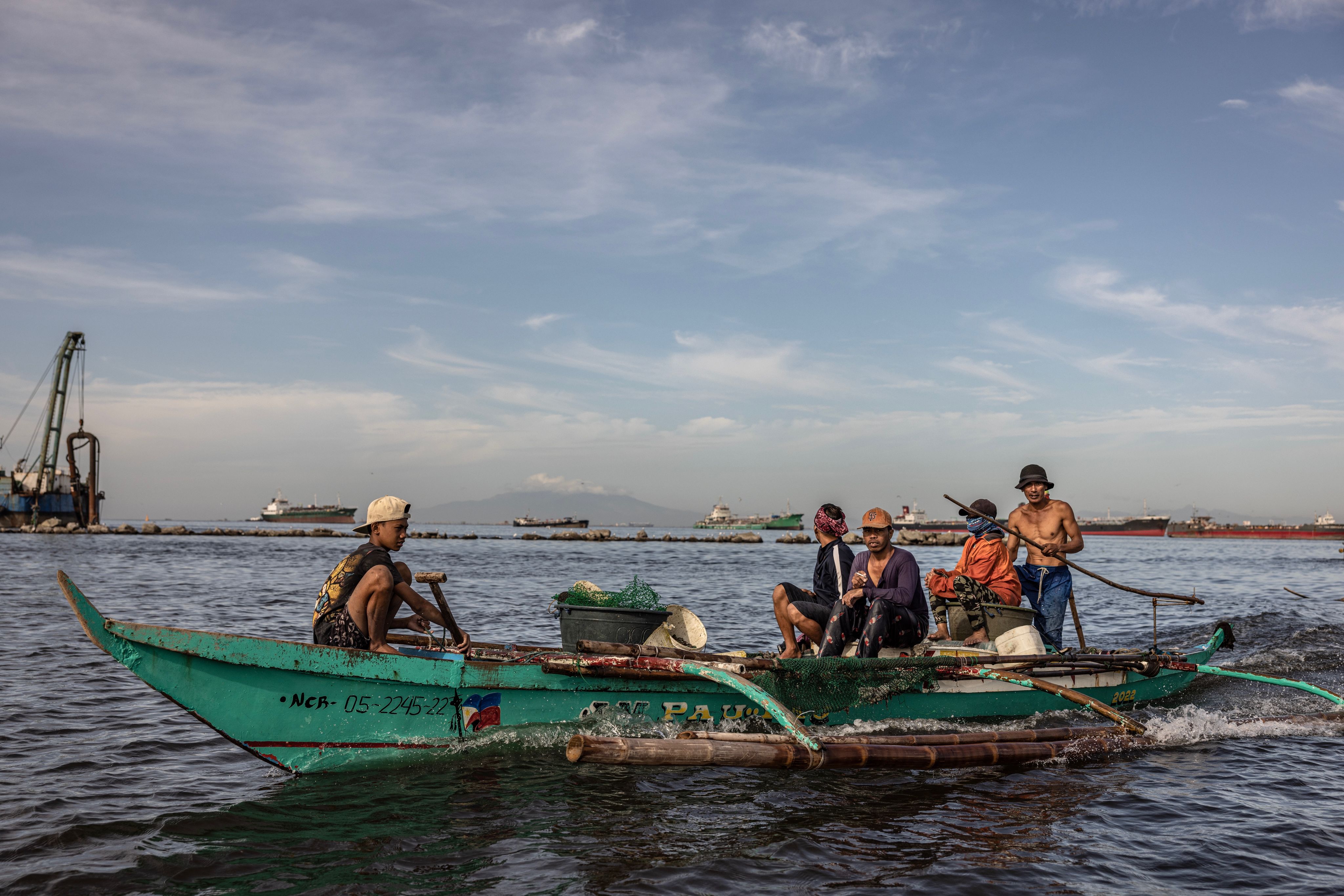 Fishermen in Philippines on boat